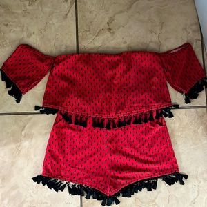 Red off the shoulder jumper with tassels and pockets. Perfect condition.